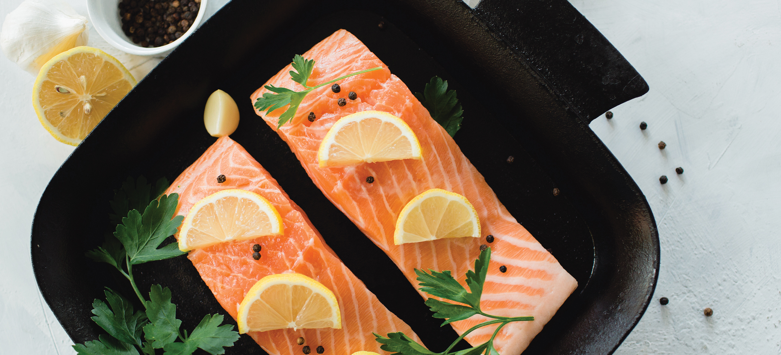 salmon cooking on skillet 