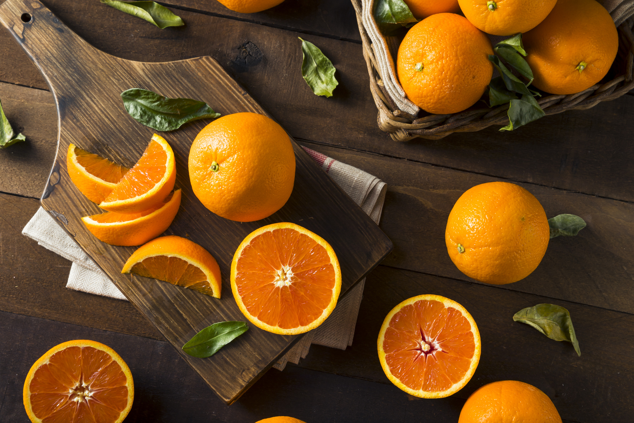 slices navel oranges on board 